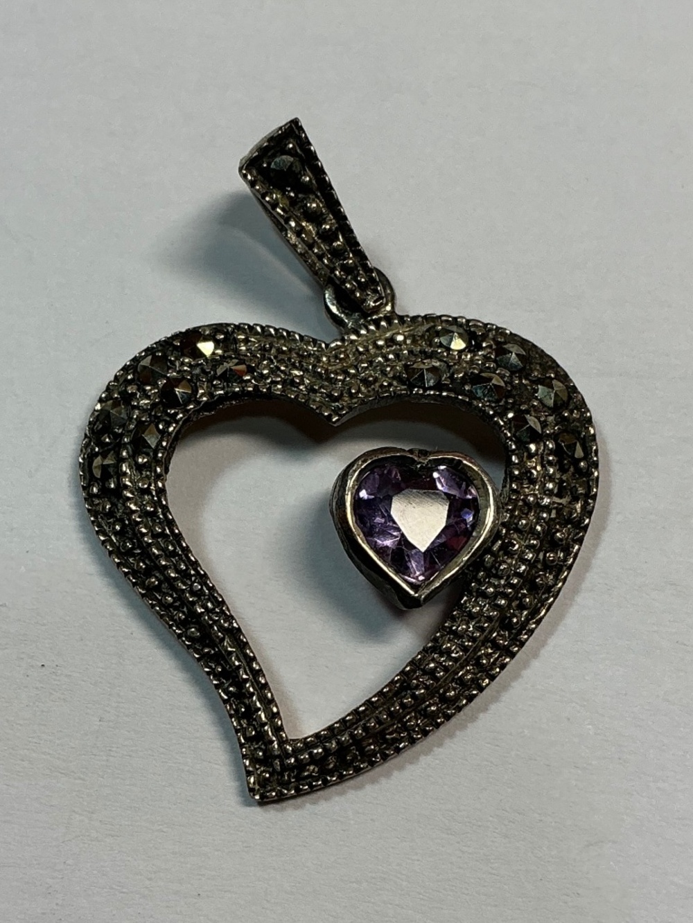 Sterling Silver Open Heart Pendant with Marcasite and an Amethyst Stone. 1.5”